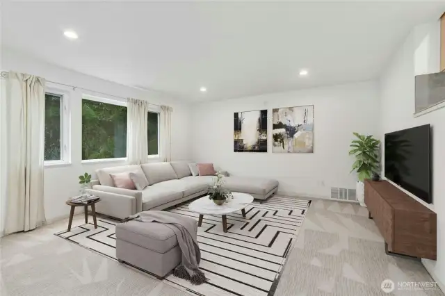 The spacious step-down living room is perfect for overnight guests or a year-round rental for extra income.