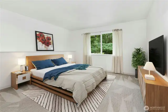Lower-level 4th bedroom, exceptionally spacious with a walk-in closet.