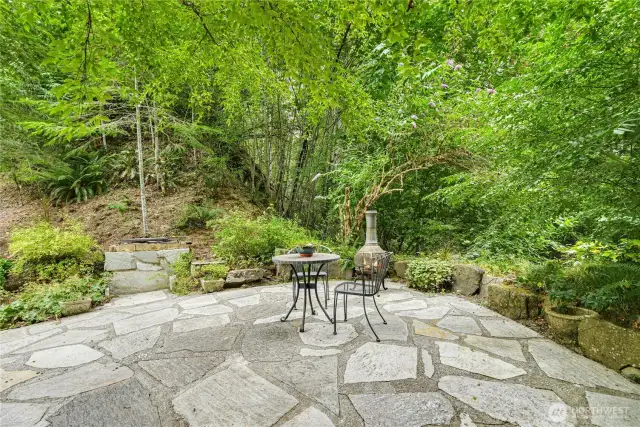 Enjoy this private outdoor seating, a true bird-watcher's paradise.
