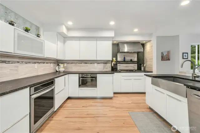 Spacious kitchen with ample counter space and abundant storage.