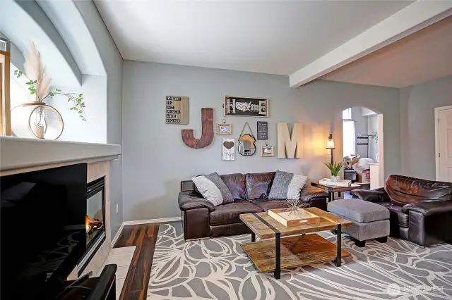 A view from kitchen dining area toward family room.