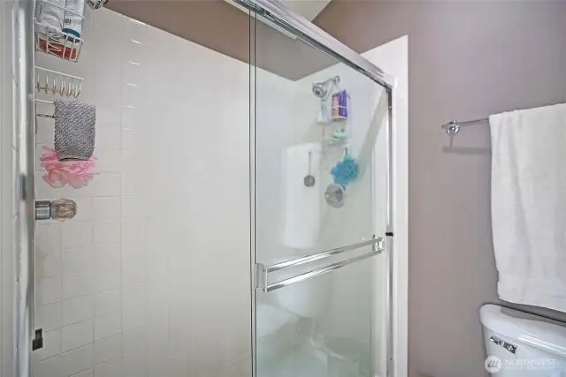 The primary bedroom stand alone shower.