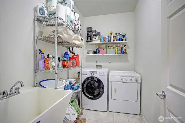 Covenient utility sink in the large laundry room.