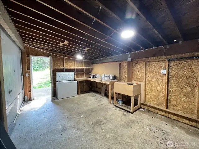 Shop has plenty of workbench space and storage