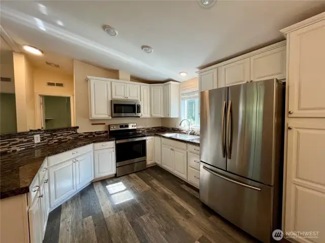 Spacious Kitchen with window to backyard