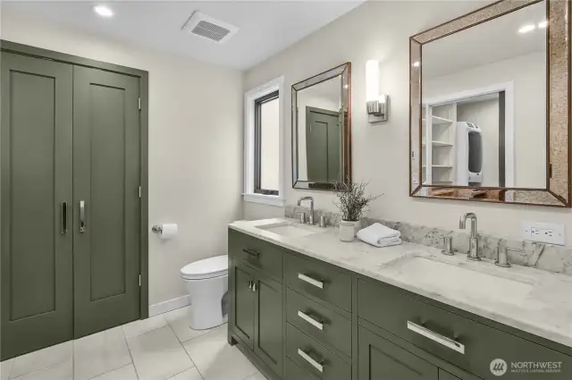 Heated floors, towel warming bar, walk-in closet with full-sized washer & dryer, and roll in shower stall.