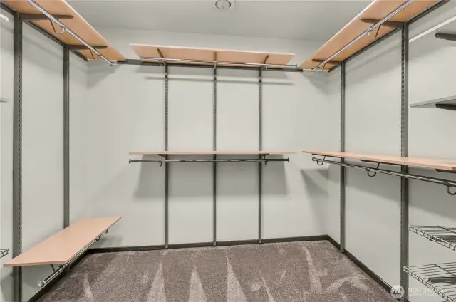 Spacious and organized owner's closet upstairs.