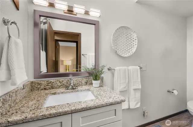 Upstairs full bathroom for guests and family.
