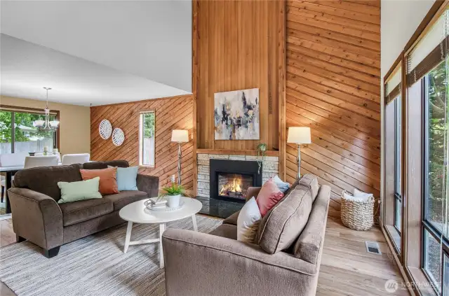 Interior use of cedar adds a unique and custom warmth to the living room and staircase of this home.