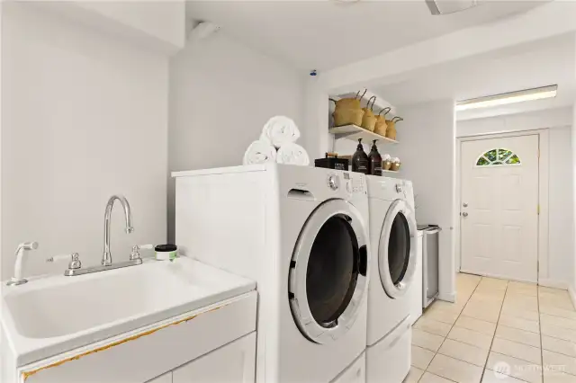 Laundry room just off the lower level bonus room.