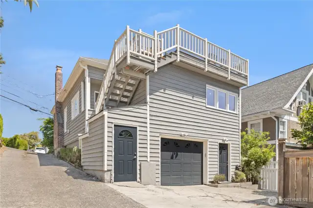1 car garage with a parking pad.