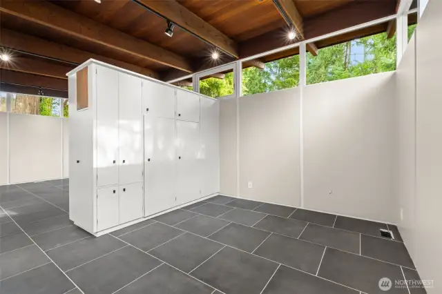 Primary retreat designed with smart storage solutions, freeing the room from the need for extra furniture.