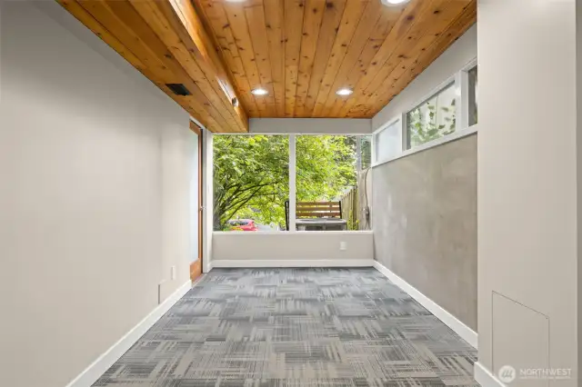 Lower level flex space. Half bath has been added (not pictured).  System ready for shower installation.  Bedroom or short term rental space?  Screen or half wall can be added to separate the spaces.Separate entrance.