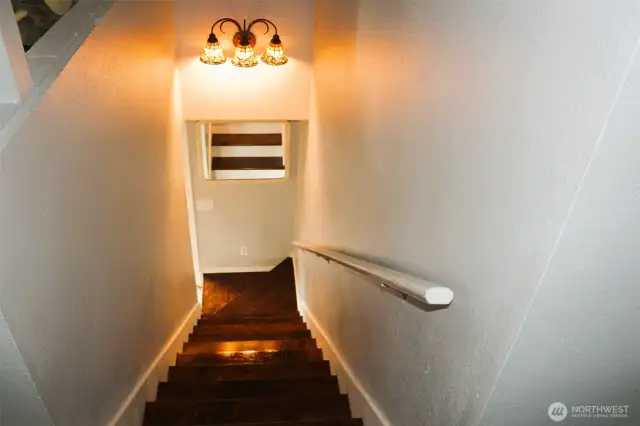 Brightly lite staircase to main floor.
