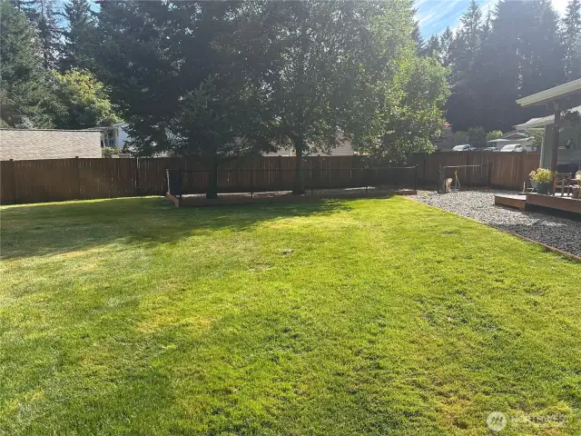 You may want to zoom into this picture to see the fully fenced dog kennel with a gate. It is just off the back patio so your pets can still be a included with the backyard entertainment.