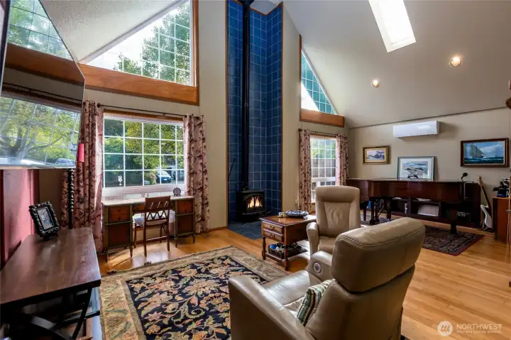 living room piano is in dining area