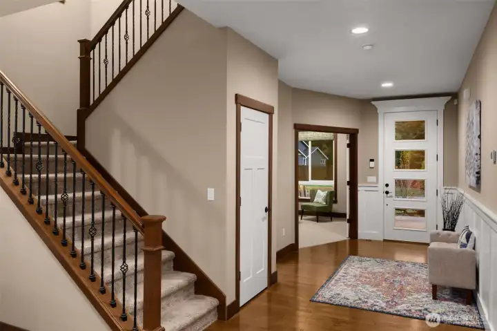 Looking back to the foyer and the front office with French doors.