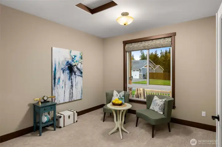 Front office with French doors. This could be a 5th main floor bedroom (closet out of view to the left).