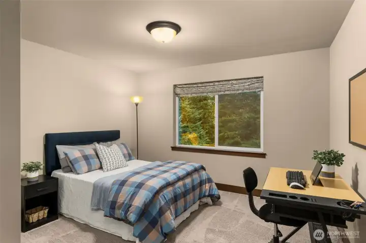 In addition to the primary suite, there are 3 large bedrooms upstairs.  This is 1 of 3. 4 total bedrooms upstairs.