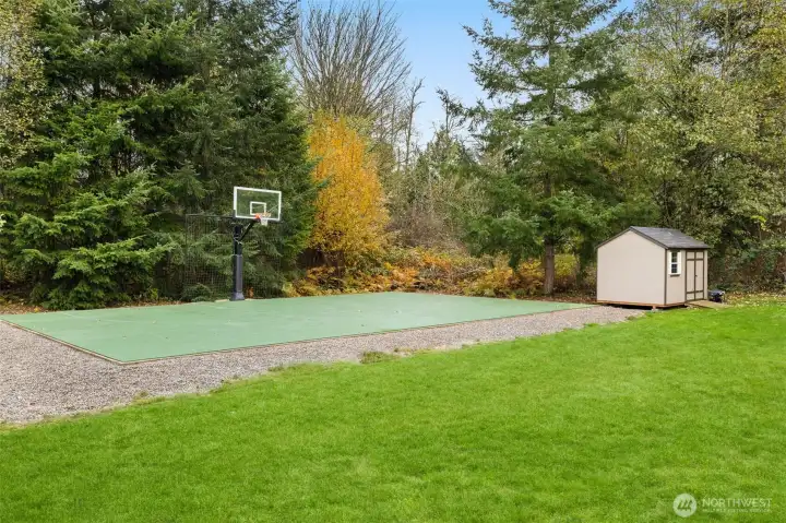Bring your own ball – your regulation NBA 3-point line is waiting. Play on this sport court (sport court tile on cement slab) with Mega Slam™ in ground hoop. Seriously awesome. Maybe add pickleball court lines for multipurpose play?