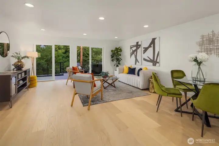 spacious living room connected to well-appointed kitchen