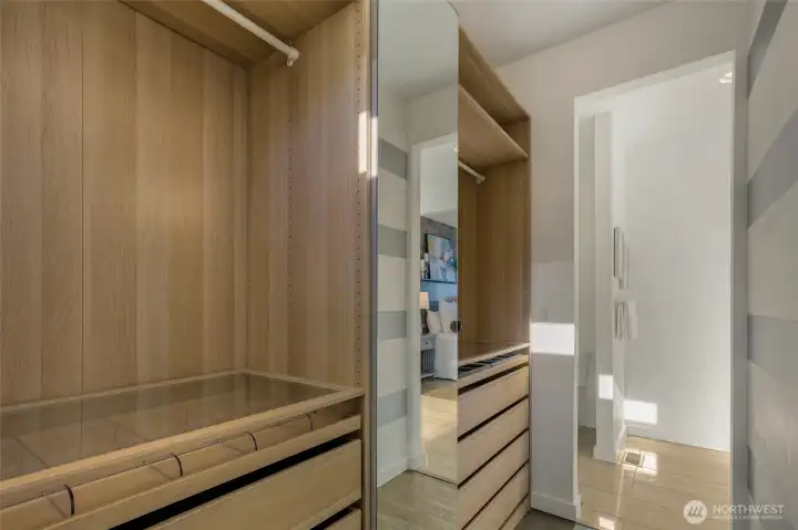 Primary bedroom walk-in closet