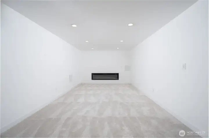 The perfect space for an at home theater, or for cozy nights by your brand new electric fireplace.