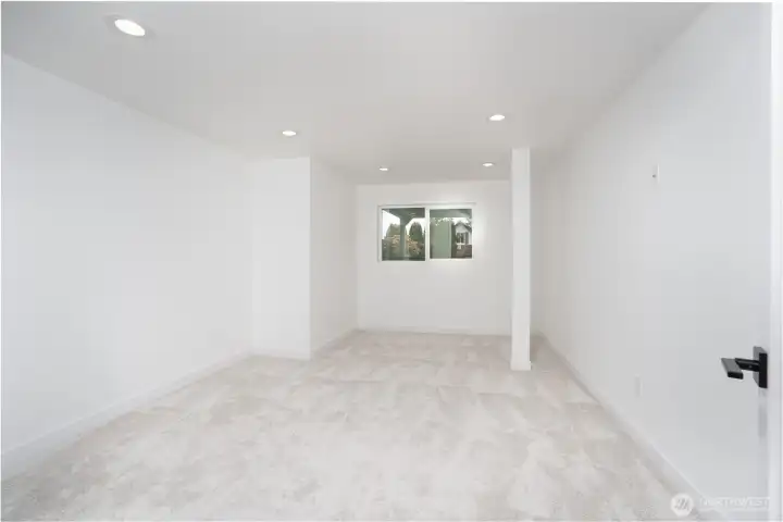 Downstairs bedrooom, with lots of natural light.