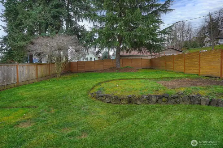 Fully fenced backyard, new fence as of 3/4 years ago.