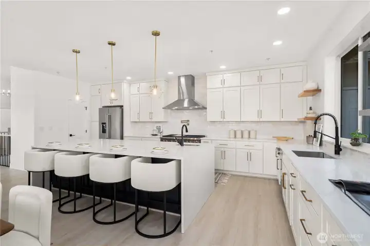 The reimagined chef’s kitchen serves as a stunning centerpiece