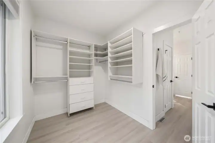 Master closet with built in shelves