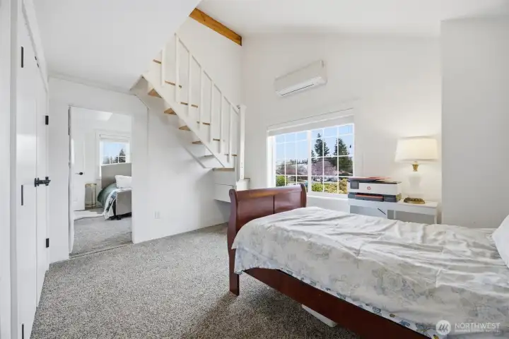 The two upper bedrooms can open to one another, or be closed off! These rooms also have a large closet wall and plenty of space for a bed and furniture...but there is another bed up those steps!