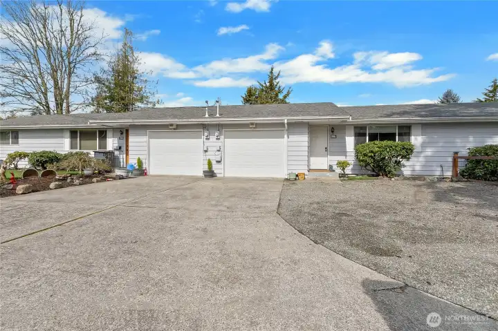 Welcome to this well maintained Duplex! The garages separate the units for additional privacy.