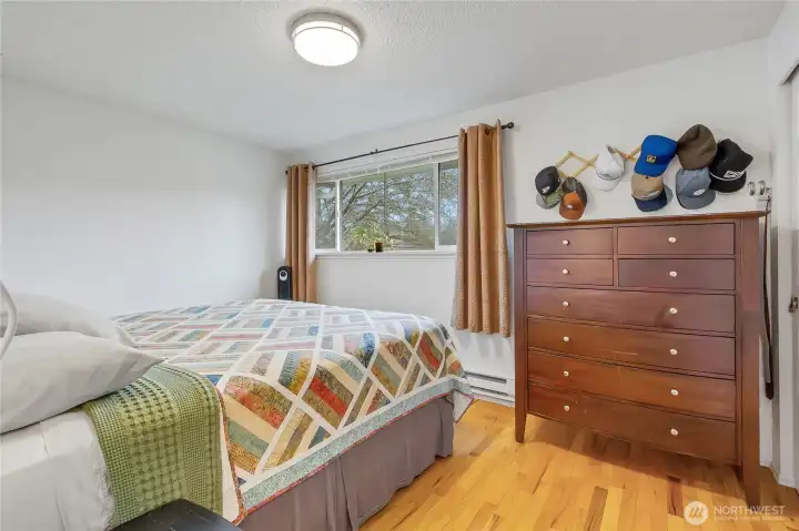 Bedroom #1 in unit 8313 has hardwood floors.