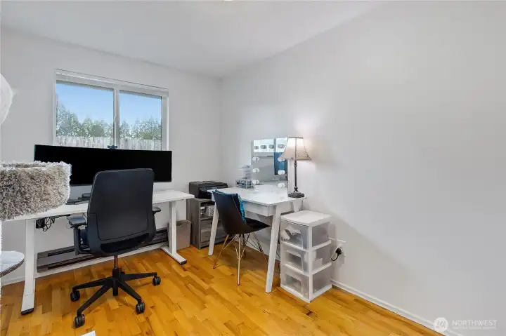 Bedroom #2 with hardwood floors.
