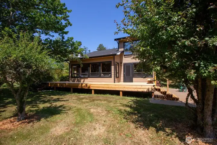 House faces south. 7 large windows from great room and dining room allow plenty of light all year round. New deck Fall of 2025.