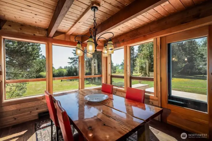 Dining area faces southeast and south to allow scenic views of the parklike setting.