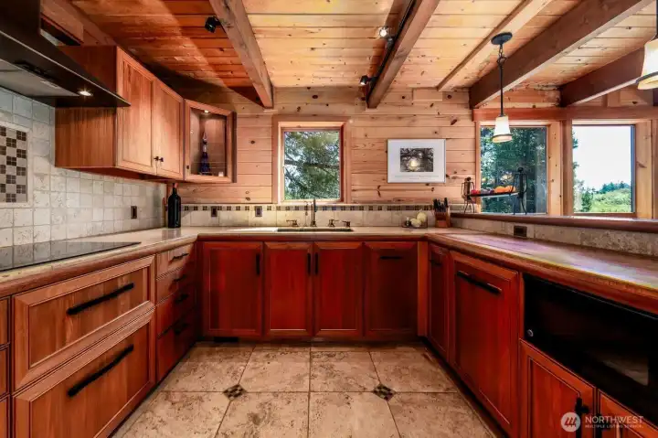 Custom made kitchen by Treehouse Remodeling. Copper sink. Everything custom made for this space.
