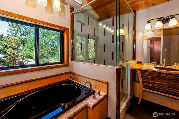 Primary bath has a soaking tub.