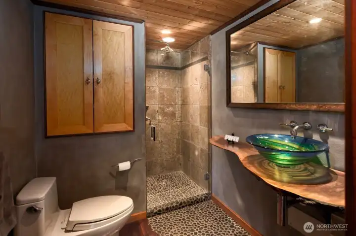 Guest bedroom 3/4 bath created and built by Treehouse Remodeling.