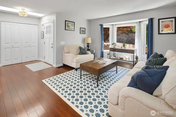 Front entry w/ open concept formal living/dining & kitchen