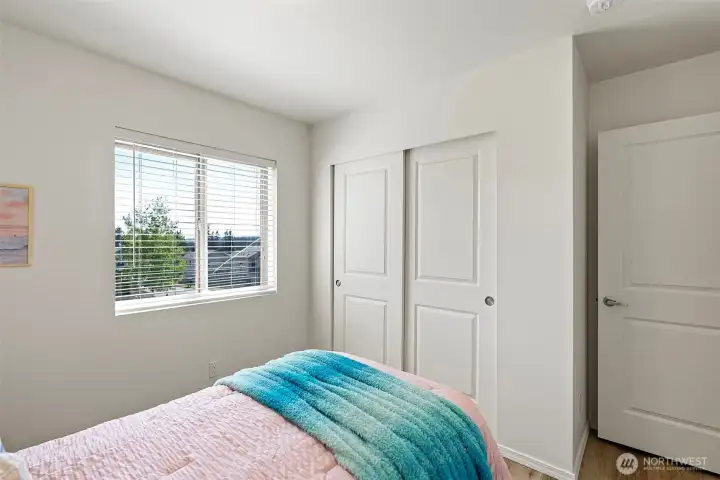 bedroom 2 from corner with closet