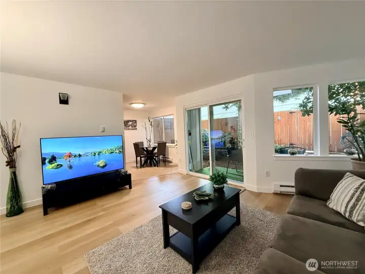 Another living room view, with the dining area beyond.