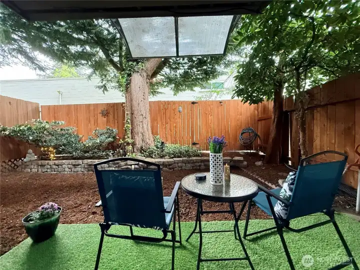 A private covered patio, and peaceful backyard