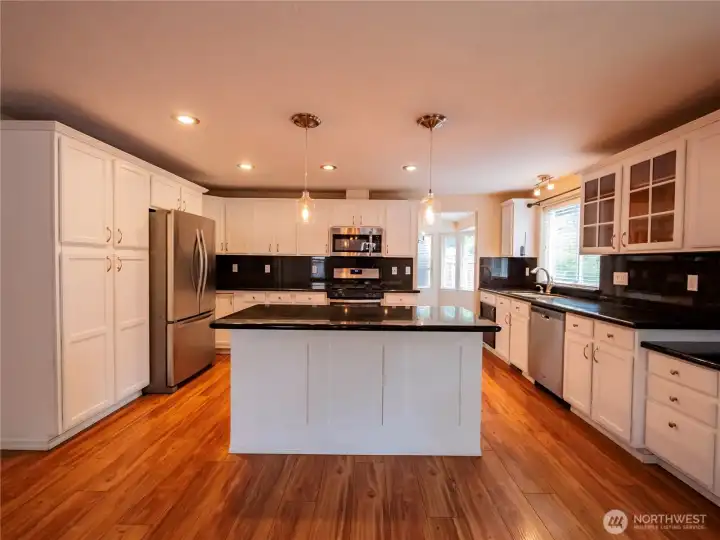 KITCHEN...DUH...WITH GRANITE COUNTERS AND LARGE ISLAND