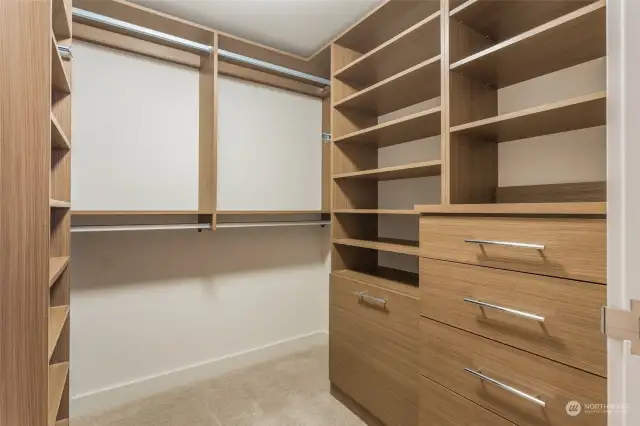 Walk in closet fitted with CA Closets built in system