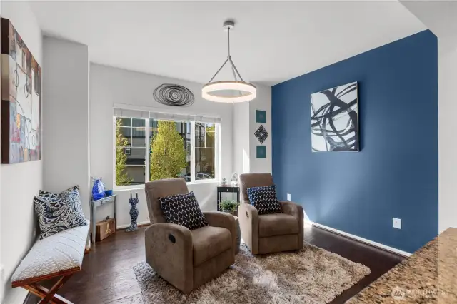 This flexible space is meant to be a dining room but it can also be and extra living space or office area.