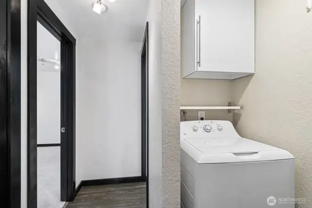 Laundry area discretely tucked away here.