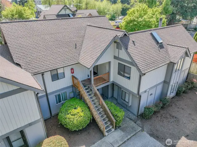 Tastefully landscaped for an inviting front entrance.