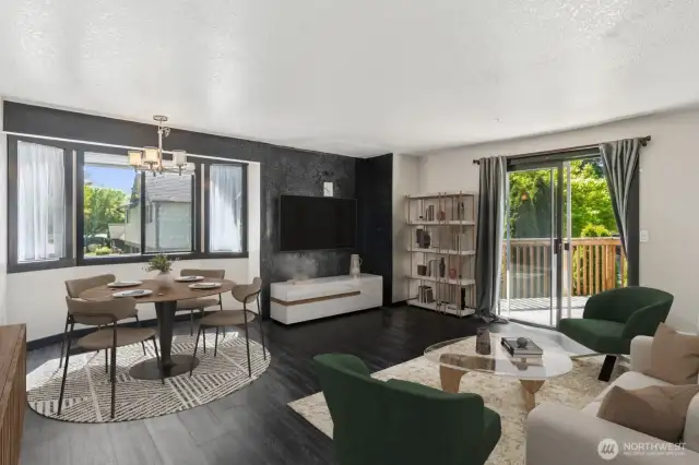 A comfortable living space blends perfectly with dining space. This photo is virtually staged.